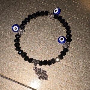 Black Beaded Bracelet with Blue Evil Eye Charms